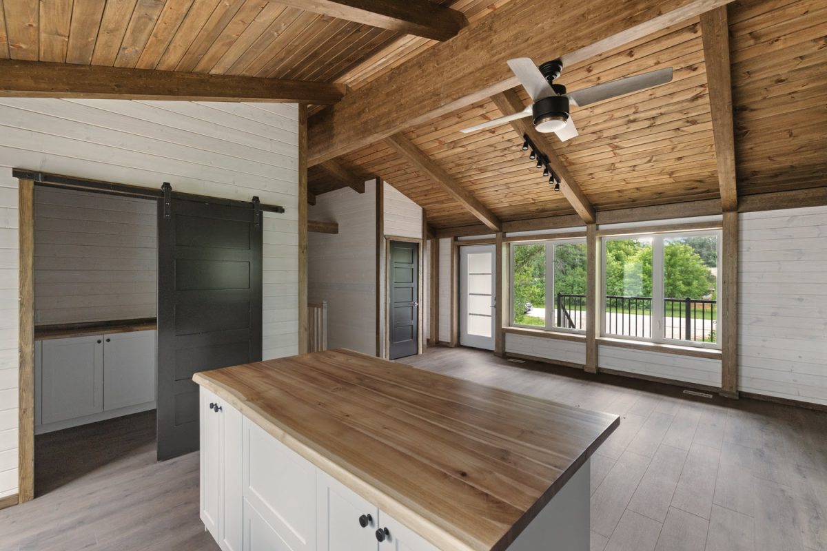 Three-bedroom Cornerstone kit house with timber interior
